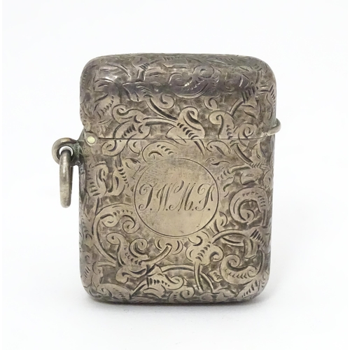 539 - A silver vesta case with engraved acanthus scroll decoration, hallmarked London 1901, maker Goldsmit... 