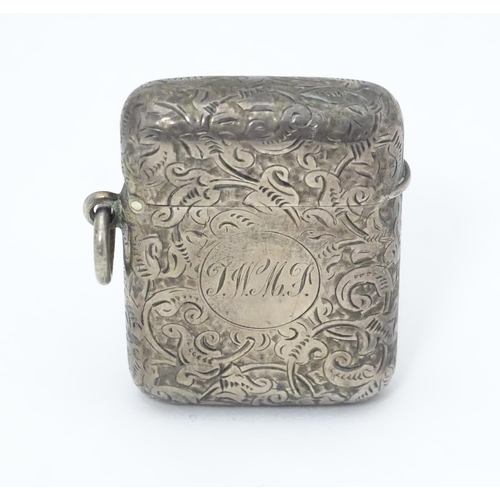 539 - A silver vesta case with engraved acanthus scroll decoration, hallmarked London 1901, maker Goldsmit... 