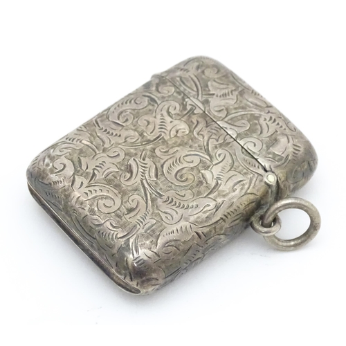 539 - A silver vesta case with engraved acanthus scroll decoration, hallmarked London 1901, maker Goldsmit... 