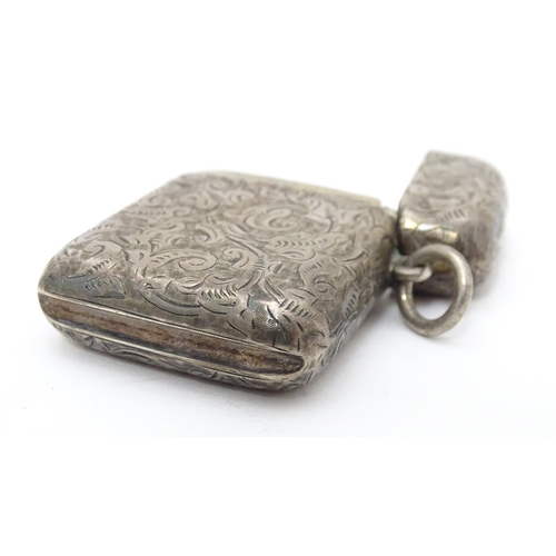 539 - A silver vesta case with engraved acanthus scroll decoration, hallmarked London 1901, maker Goldsmit... 