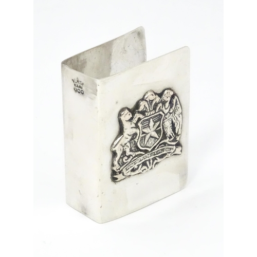 545 - A Chilian .900 silver match box cover / sleeve with applied National crest for Chile to top, and sta... 