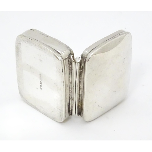 546 - A .925 silver pill box of rectangular form. Approx. 1 1/2