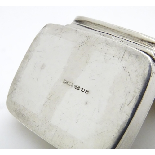 546 - A .925 silver pill box of rectangular form. Approx. 1 1/2