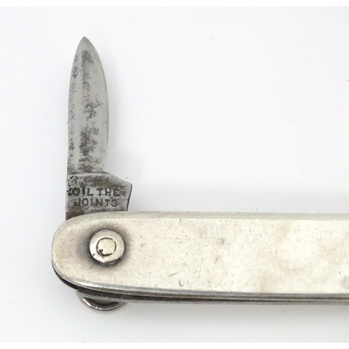 556 - A silver folding twin blade knife, hallmarked Sheffield 1903, maker Brookes & Crookes. Approx. 3