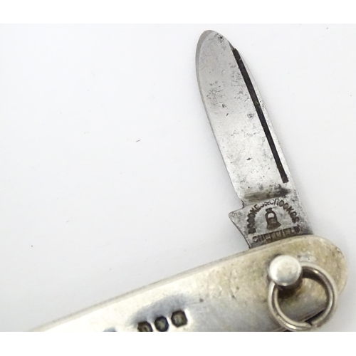 556 - A silver folding twin blade knife, hallmarked Sheffield 1903, maker Brookes & Crookes. Approx. 3