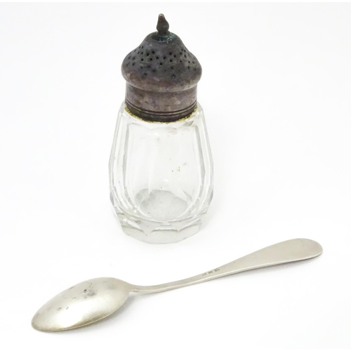 558 - A Victorian cut glass pepper with silver top hallmarked London 1876. Together with a German .800 sil... 