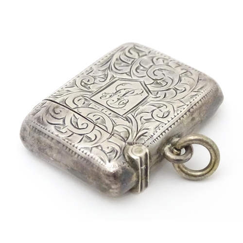 571 - A silver vesta case with engraved acanthus scroll decoration, hallmarked Birmingham 1907, maker Albe... 