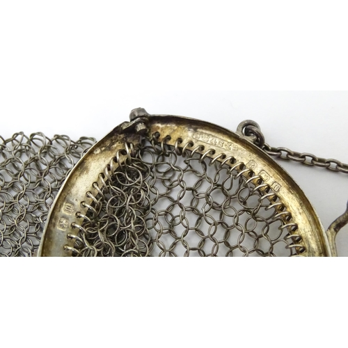 578 - A silver purse of chain mesh form, hallmarked Birmingham 1911, maker S. Blanckensee & Sons Ltd. Toge... 