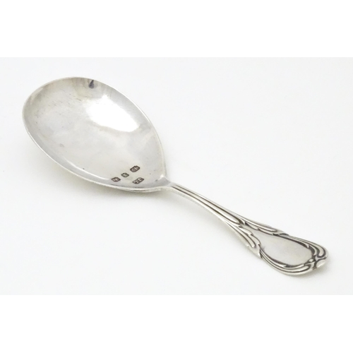 584 - A Victorian silver caddy spoon hallmarked Birmingham 1897, maker Joseph Gloster. Approx. 4 1/5