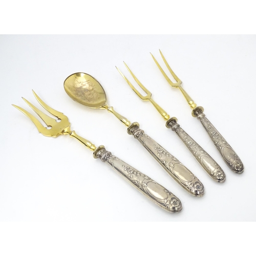 605 - A cased Art Nouveau German .800 silver handled serving set, the handles decorated with strawberries,... 