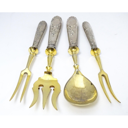 605 - A cased Art Nouveau German .800 silver handled serving set, the handles decorated with strawberries,... 