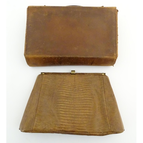 1179 - A late 19thC / early 20thC pig skin travelling vanity case of satchel form with blue leather lining,... 