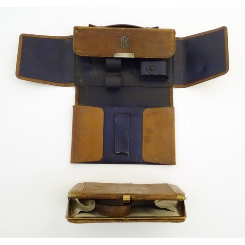 1179 - A late 19thC / early 20thC pig skin travelling vanity case of satchel form with blue leather lining,... 