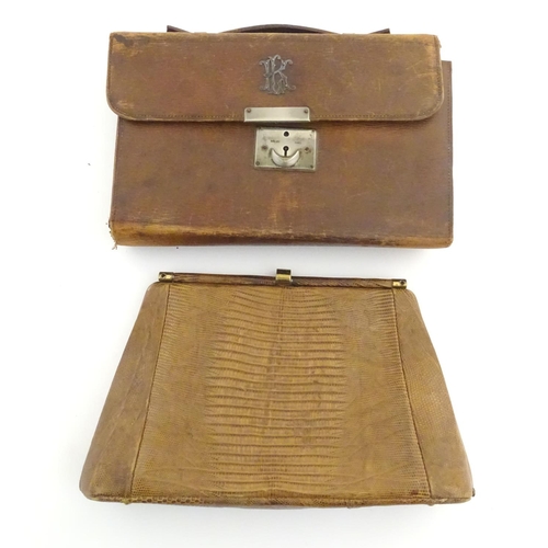 1179 - A late 19thC / early 20thC pig skin travelling vanity case of satchel form with blue leather lining,... 