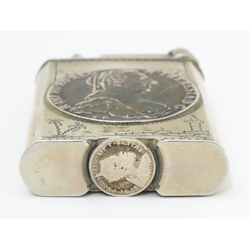 1195 - A pocket lighter, engraved with native scenes and inset with Thaler coin style detail, approx 2 7/8