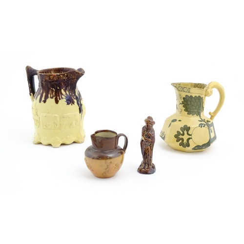 110 - Four assorted Victorian and later stoneware items to include a Royal Doulton jug, a small Doulton La... 