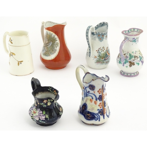 168 - Six assorted 19thC and later jugs to include a Masons ironstone example in the Black Chinese pattern... 