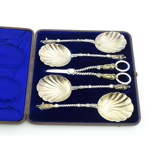 421 - A silver plate fruit serving set comprising servers and grape shears, with gilded shell formed bowls... 