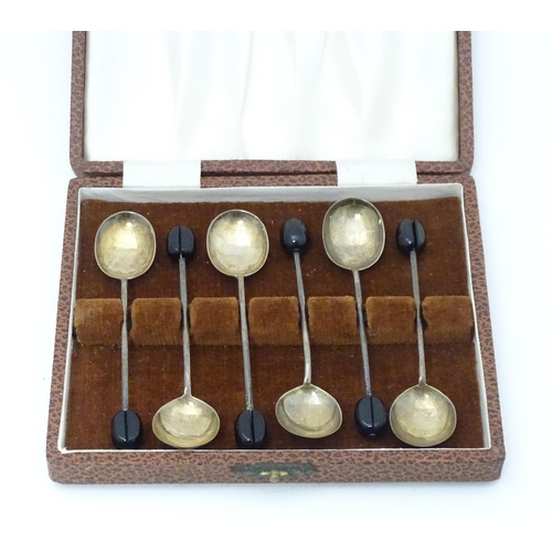 614 - Set of six silver coffee spoons with coffee bean decoration to handles Hallmarked Sheffield 1955 mak... 