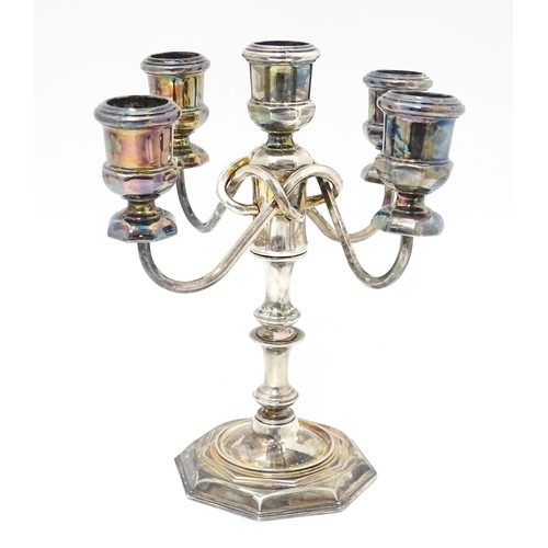 627 - A silver plate candelabra / candelabrum. Approx. 8