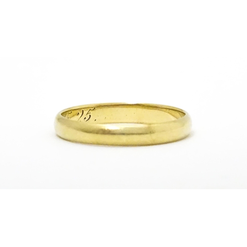 643 - A 14ct gold wedding band marked 585 RDJ and  maker Scheel . Ring size approx. Q 1/2