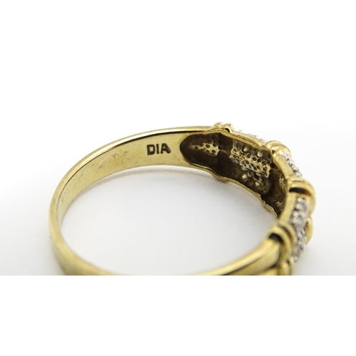 644 - A 9ct gold ring having double band detail with six segments each set with four diamonds. Ring size a... 