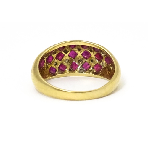 671 - A 9ct gold ring set with rubies and diamonds. Ring size approx  L 1/2