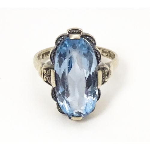 676 - A Continental .830 silver ring set with aquamarine. Ring size approx. L 1/2