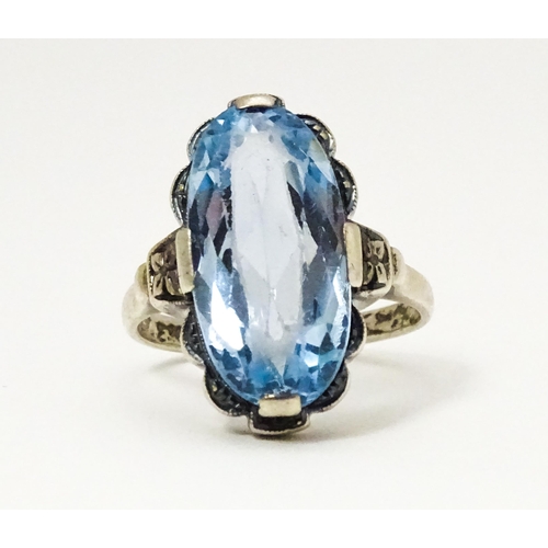 676 - A Continental .830 silver ring set with aquamarine. Ring size approx. L 1/2