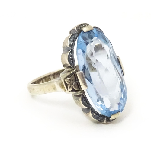 676 - A Continental .830 silver ring set with aquamarine. Ring size approx. L 1/2