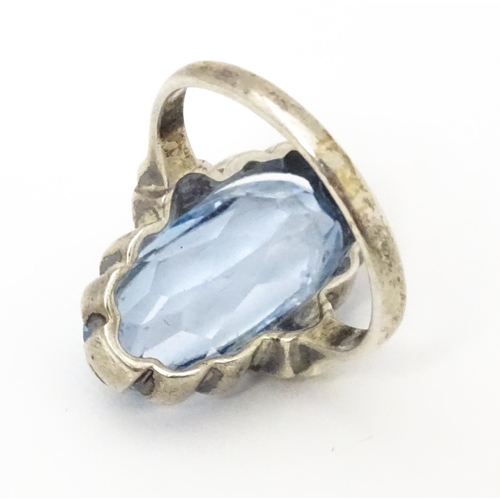 676 - A Continental .830 silver ring set with aquamarine. Ring size approx. L 1/2