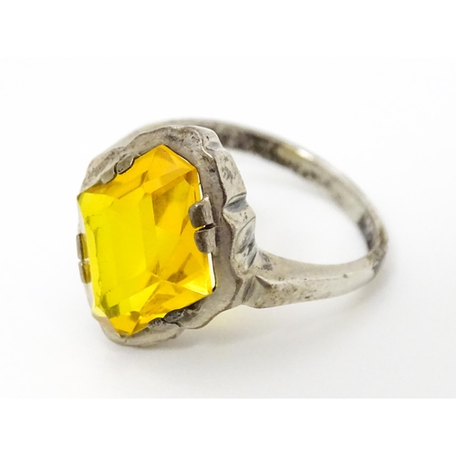 677 - A Continental .835 silver ring set with citrine. Ring size approx. O