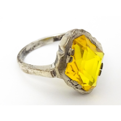 677 - A Continental .835 silver ring set with citrine. Ring size approx. O