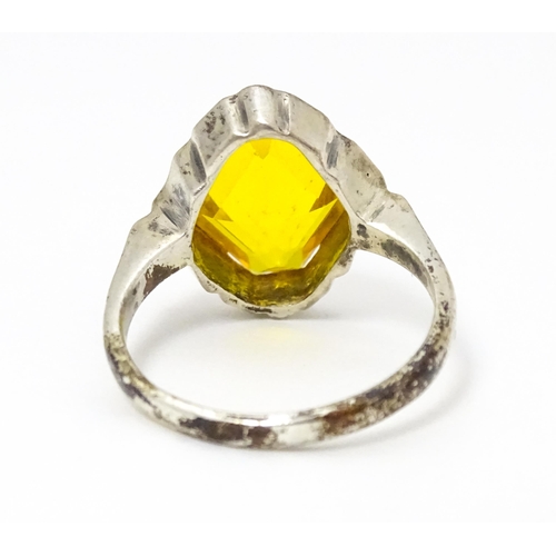 677 - A Continental .835 silver ring set with citrine. Ring size approx. O