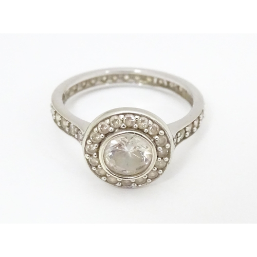 685 - A 9ct white gold ring set with cubic zirconia. Ring size approx. L 1/2