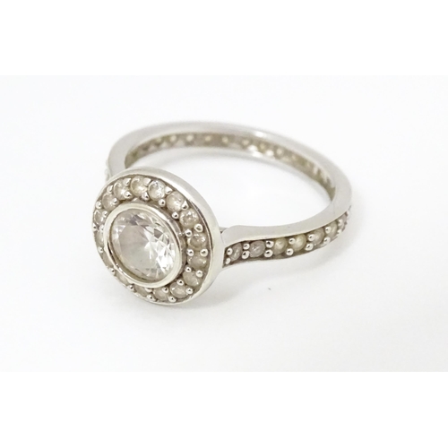 685 - A 9ct white gold ring set with cubic zirconia. Ring size approx. L 1/2