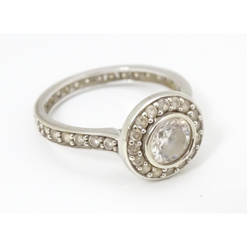 685 - A 9ct white gold ring set with cubic zirconia. Ring size approx. L 1/2