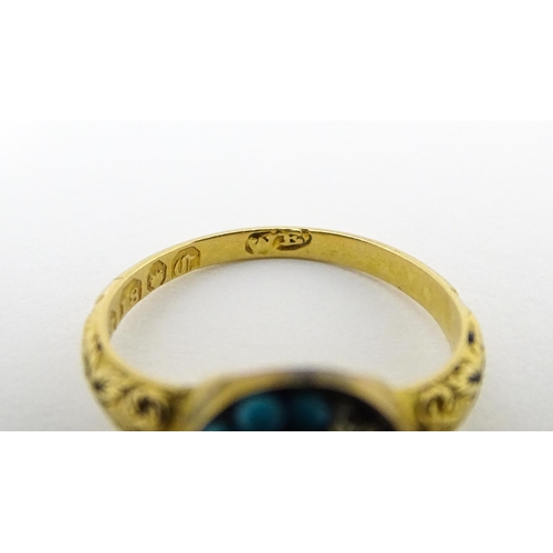 695 - An 18ct gold ring set with sapphires and diamonds. Together with a Victorian 18ct gold ring set with... 