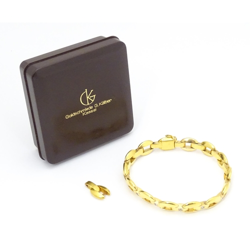 712 - WITHDRAWN FROM AUCTION - Apologies for any inconvenience. A German 14ct gold bracelet set with 4 dia... 