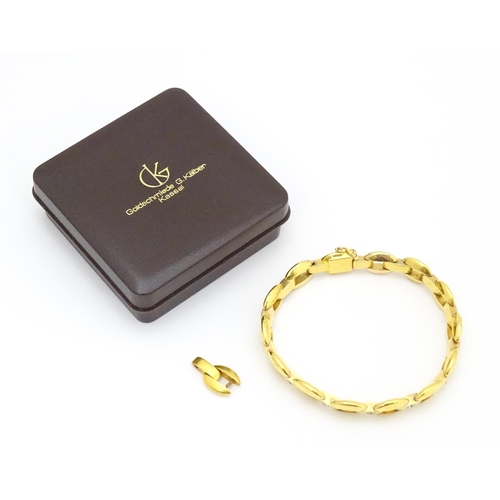 712 - WITHDRAWN FROM AUCTION - Apologies for any inconvenience. A German 14ct gold bracelet set with 4 dia... 