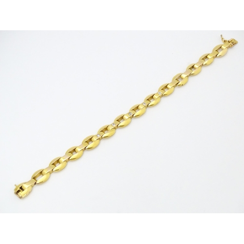 712 - WITHDRAWN FROM AUCTION - Apologies for any inconvenience. A German 14ct gold bracelet set with 4 dia... 