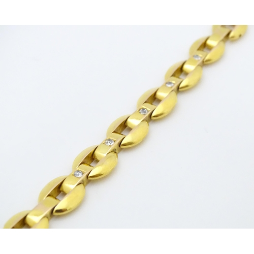 712 - WITHDRAWN FROM AUCTION - Apologies for any inconvenience. A German 14ct gold bracelet set with 4 dia... 