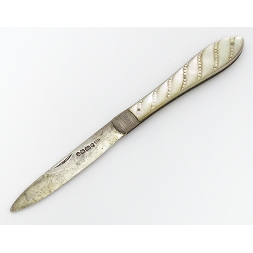 308 - A Victorian silver folding fruit knife with mother of pearl handle hallmarked Sheffield 1864 maker T... 