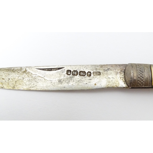 308 - A Victorian silver folding fruit knife with mother of pearl handle hallmarked Sheffield 1864 maker T... 