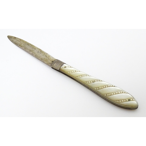 308 - A Victorian silver folding fruit knife with mother of pearl handle hallmarked Sheffield 1864 maker T... 