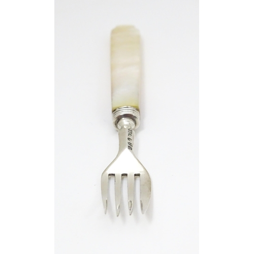 394 - A Victorian silver fork with mother of pearl handle. Hallmarked Birmingham 1844 maker John Hilliard.... 