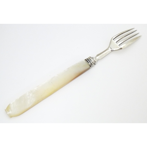 394 - A Victorian silver fork with mother of pearl handle. Hallmarked Birmingham 1844 maker John Hilliard.... 