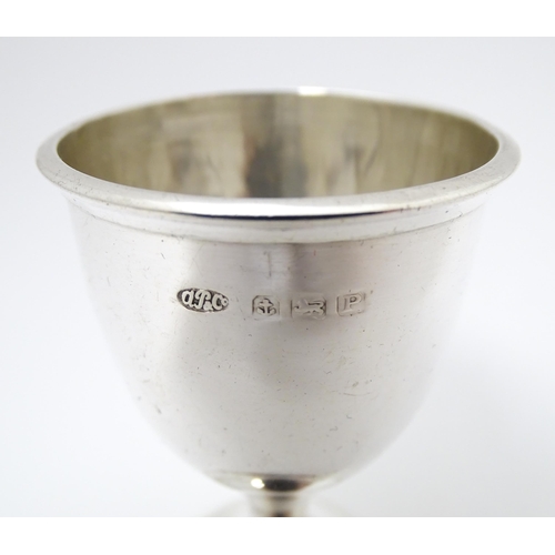 403 - A cased silver egg cup and spoon, hallmarked Birmingham 1939 maker Arthur Price & Co Ltd.