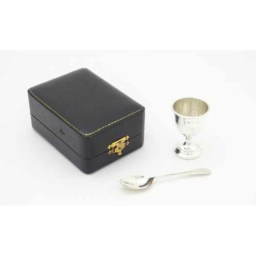 403 - A cased silver egg cup and spoon, hallmarked Birmingham 1939 maker Arthur Price & Co Ltd.