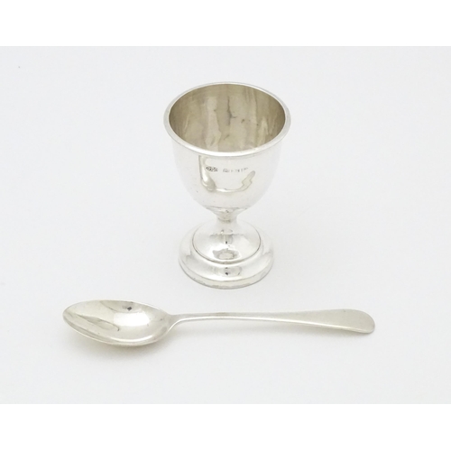 403 - A cased silver egg cup and spoon, hallmarked Birmingham 1939 maker Arthur Price & Co Ltd.